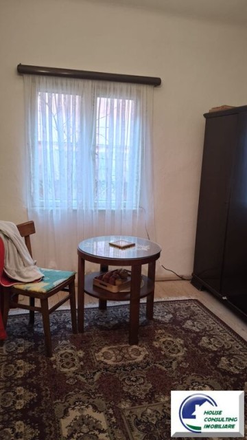 casa-cu-patru-camere-si-teren-situata-in-busteni-3