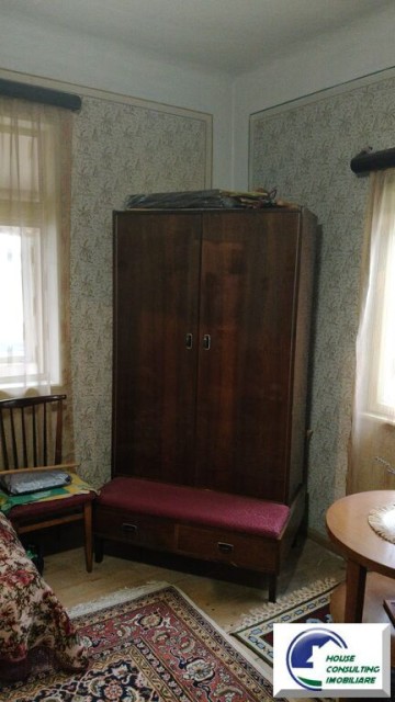 casa-cu-patru-camere-si-teren-situata-in-busteni-5
